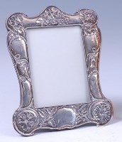 Lot 130 - An Art Nouveau silver easel photograph frame,...