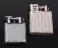 Lot 138 - A 1930s Dunhill silver plated engine turned...