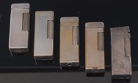 Lot 141 - Five 1950s Dunhill silver plated engine turned...