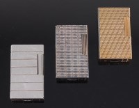 Lot 148 - A 1970s Dupont gold plated pocket lighter,...