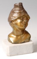 Lot 189 - A Continental Art Deco bronzed metal bust of a...
