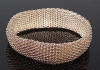 Lot 2266 - A Tiffany & Co silver meshlink bracelet, 52g,...