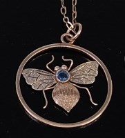 Lot 2296 - A 9ct two-colour gold pendant, modelled as a...