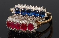 Lot 2225 - A pair of 9ct gold rings, one set with five...