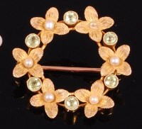 Lot 2034 - A 15ct gold, green topaz and seed pearl set...