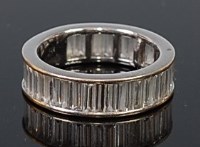 Lot 2056 - An 18ct white gold and diamond set eternity...