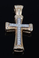 Lot 2076 - A 9ct gold and diamond point set cross pendant...