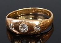 Lot 2078 - A gents 18ct gold gypsy ring, the centre old...