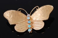 Lot 2082 - A contemporary 14ct gold and opal set...