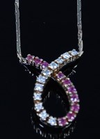 Lot 2118 - A 9ct gold, ruby and diamond set necklet,...