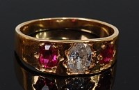 Lot 2147 - A yellow metal, ruby and diamond set gypsy...