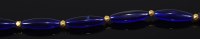 Lot 2153 - A Bohemian blue glass and high carat gold...