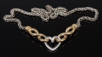 Lot 2159 - A modern 9ct gold, silver and diamond set...