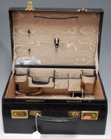Lot 142 - An early 20th century black leather clad...
