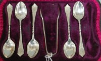 Lot 256 - A cased set of five silver teaspoons with...
