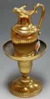 Lot 34 - An electro plated water jug of half fluted...