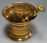 Lot 37 - A late 19th century turned brass pestle and...