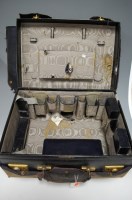 Lot 157 - An early 20th century black leather clad...