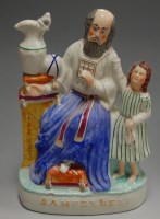 Lot 17 - A Victorian Staffordshire flatback figure of...