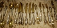 Lot 300 - A quantity of Continental white metal handled...