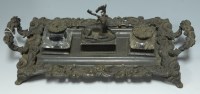 Lot 147 - *A Victorian cast brass desk stand, the...