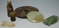 Lot 374 - A Chinese polished hardstone roundel, carved...
