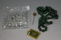 Lot 380 - A jadeite double string choker; together with...