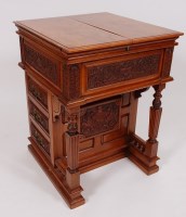Lot 3666 - A late Victorian walnut writing davenport, of...