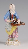 Lot 3083 - A Meissen porcelain figure 'The Hurdy-Gurdy...