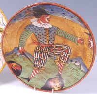 Lot 3134 - *An early 19th century glazed buff earthenware...