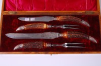 Lot 3164 - A late Victorian oak cased two piece carving...