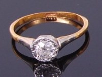 Lot 3289 - An 18ct gold diamond solitaire ring, the...