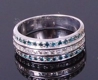 Lot 3290 - A 14ct white gold diamond half eternity ring,...