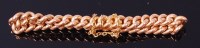 Lot 3299 - A 15ct gold curblink bracelet with safety...
