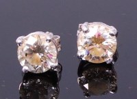 Lot 3308 - A pair of 18ct white gold and diamond set ear...