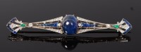 Lot 3320 - A platinum, sapphire, emerald and diamond set...