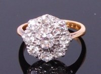 Lot 3324 - An 18ct gold diamond flower head cluster ring,...