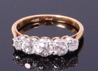 Lot 3325 - An 18ct gold and platinum diamond five stone...