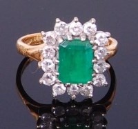 Lot 3346 - An 18ct gold, emerald and diamond ring, the...