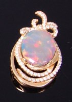 Lot 3355 - An 18ct gold, black opal and diamond set...