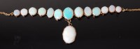 Lot 3356 - A yellow metal and opal necklace, mid-20th...