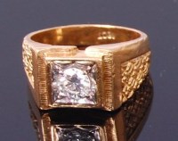 Lot 3366 - A gents 18ct gold diamond solitaire ring, the...