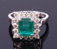 Lot 3367 - A contemporary 14ct white gold, emerald and...