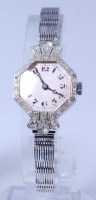 Lot 3396 - An Art Deco ladies 18ct white gold and diamond...