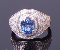 Lot 3398 - A contemporary 14ct white gold, sapphire and...