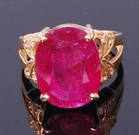 Lot 3399 - A contemporary 18ct gold ruby set dress ring,...