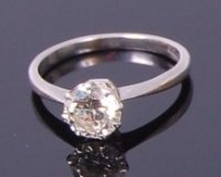 Lot 3403 - A platinum diamond solitaire ring, the claw...