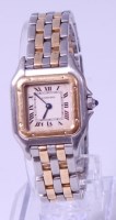 Lot 3408 - A ladies Cartier bi-metal steel and 18ct gold...