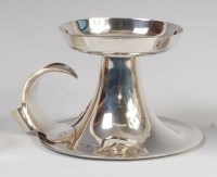 Lot 3221 - An Edwardian Arts & Crafts silver chamberstick,...