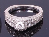 Lot 3417 - A modern 14ct white gold diamond ring,...